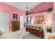 Bright bedroom with light walls, a ceiling fan, and a doorway at 3603 Westerham Dr, Clermont, FL 34711