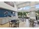 Bright community room with seating, coffee station, and large windows showing the exterior at 3603 Westerham Dr, Clermont, FL 34711