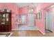 Bright entryway with tile flooring, laminate floors, and a white front door with side lighting at 3603 Westerham Dr, Clermont, FL 34711