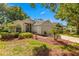 Charming single-story home with lush landscaping, a two-car garage, and a welcoming entrance at 3603 Westerham Dr, Clermont, FL 34711