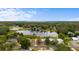 Aerial view of homes shows lake and neighborhood location at 37132 Turner Dr, Umatilla, FL 32784