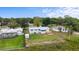 Aerial view of home shows spacious yard and neighborhood location at 37132 Turner Dr, Umatilla, FL 32784