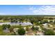 Aerial view of homes shows lake and neighborhood location at 37132 Turner Dr, Umatilla, FL 32784