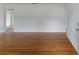 Open living room featuring hardwood floors and ample space for entertaining guests at 37132 Turner Dr, Umatilla, FL 32784