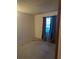 Cozy carpeted bedroom with a window dressed with elegant gray curtains for a comforting ambiance at 4294 Nimons St, Orlando, FL 32811