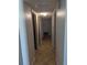Hallway with multiple doors and tile floors at 4294 Nimons St, Orlando, FL 32811