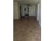 Open living room with tiled floors and ceiling fan, ready for your personal touch at 4294 Nimons St, Orlando, FL 32811