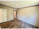 Bedroom with plank floors at 43740 Sunset Dr, Paisley, FL 32767