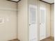 A well-organized closet space with shelving and ample room for storage at 43740 Sunset Dr, Paisley, FL 32767