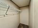 Image of a walk-in closet with neutral walls and a sturdy wire shelf system at 43740 Sunset Dr, Paisley, FL 32767