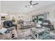 Open-concept living space with a seamless flow to the patio and private pool area at 4406 Creighton Loop, The Villages, FL 32163