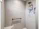 Shower featuring neutral colored subway tile at 4406 Creighton Loop, The Villages, FL 32163