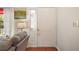 Inviting front door with sidelight and interior view, enhanced by natural light and cozy decor at 4553 Belle Grv, Leesburg, FL 34748