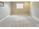 This bright bedroom is ready for you to make it your own and has neutral paint and carpet at 500 Newell Hill Rd # D, Leesburg, FL 34748