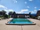A refreshing community pool, perfect for relaxing and enjoying sunny days with beautiful building views at 500 Newell Hill Rd # D, Leesburg, FL 34748