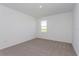 Inviting bedroom with neutral carpet, natural light, and a serene atmosphere at 5031 Abigail Dr, Lake Wales, FL 33859