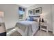 The bedroom features neutral tones, creating a soothing and inviting atmosphere with comfortable furnishings and stylish decor at 5039 Abigail Dr, Lake Wales, FL 33859