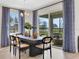 Elegant dining room with a modern table, stylish chairs, and plenty of natural light at 5039 Abigail Dr, Lake Wales, FL 33859