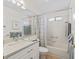 Well-lit bathroom featuring a bathtub and single sink vanity at 511 Chula Vista Ave, The Villages, FL 32159