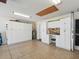 Well-organized garage featuring built-in cabinets, a work station, and ample storage space at 511 Chula Vista Ave, The Villages, FL 32159