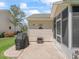 Outdoor patio with a grill, perfect for entertaining and enjoying the home's exterior at 511 Chula Vista Ave, The Villages, FL 32159