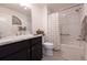 Modern bathroom featuring subway tile, shower-tub combo, marble vanity top and neutral color palette at 5325 Zisa Ct, The Villages, FL 32163