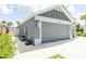 Well maintained home with a two-car garage and attractive landscaping at 5325 Zisa Ct, The Villages, FL 32163