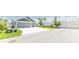 Charming home with a large driveway and well-kept landscaping at 5325 Zisa Ct, The Villages, FL 32163