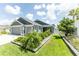 Charming single-Gathering home with a well-manicured lawn and inviting curb appeal at 5325 Zisa Ct, The Villages, FL 32163