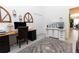 Bright and open office featuring a desk, neutral rug, and white walls at 5325 Zisa Ct, The Villages, FL 32163