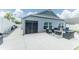 Backyard patio with stylish outdoor furniture at 5325 Zisa Ct, The Villages, FL 32163