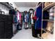 Walk-in closet with plenty of storage options, shelving units, and hanging rods at 5325 Zisa Ct, The Villages, FL 32163
