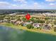 Wide aerial showing property location relative to baseball field, lake, shopping and highways at 5530 Oxford Moor Blvd, Windermere, FL 34786