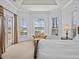 Main bedroom with sitting area offers great light and view at 5530 Oxford Moor Blvd, Windermere, FL 34786