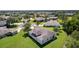 Aerial view of a home in a well-planned community, featuring lush greenery, manicured lawns, and serene surroundings at 5941 Sage Leaf Pl, Leesburg, FL 34748