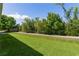 Picture of the spacious and well-maintained backyard, perfect for outdoor activities and relaxation, including a paved path at 5941 Sage Leaf Pl, Leesburg, FL 34748