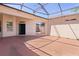 Screened lanai perfect for entertaining with easy access to the backyard and main house at 5941 Sage Leaf Pl, Leesburg, FL 34748