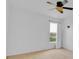 Bright bedroom with ceiling fan and natural light from the window at 597 Skyridge Rd, Clermont, FL 34711