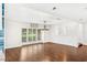 Spacious dining room featuring beautiful hardwood floors and natural light at 657 Riverpark Cir, Longwood, FL 32779