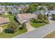 Aerial view of a lovely house with well-maintained landscaping and long driveway at 6608 Borg, Leesburg, FL 34748