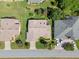 Overhead shot showcases a well-maintained home, backyard, and landscaping at 6608 Borg, Leesburg, FL 34748