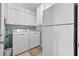 Well-equipped laundry room with a washer, dryer, and plenty of cabinet storage space at 6608 Borg, Leesburg, FL 34748