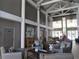 Elegant lobby showcasing high ceilings, contemporary decor, and ample seating for residents at 6608 Borg, Leesburg, FL 34748
