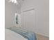 Bedroom view featuring spacious closets and wood floors, perfect for storage and comfort at 7382 Se 167Th Zina Ln, The Villages, FL 32162