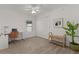 Inviting room with a modern desk, closet, and serene atmosphere, perfect for work or relaxation at 7382 Se 167Th Zina Ln, The Villages, FL 32162
