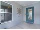 Welcoming entryway with a glass door and a view of the home's interior at 7382 Se 167Th Zina Ln, The Villages, FL 32162