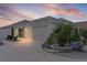 Charming one-story home featuring a two-car garage and well-manicured landscaping at 7382 Se 167Th Zina Ln, The Villages, FL 32162