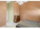 Bedroom with neutral paint, a queen-sized bed, and a ceiling fan at 791 Wolf Creek St, Clermont, FL 34711