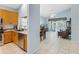 This kitchen offers stainless steel appliances and overlooks dining area and living space at 791 Wolf Creek St, Clermont, FL 34711