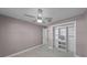 Neutral bedroom with built-in closet and modern ceiling fan at 8158 Bucksaw Dr, Orlando, FL 32817
